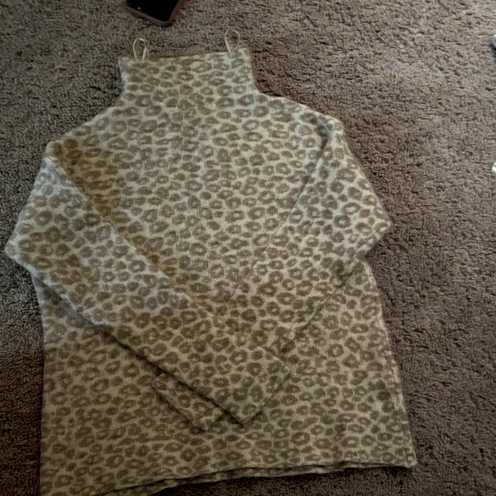 A cheetah print turtleneck